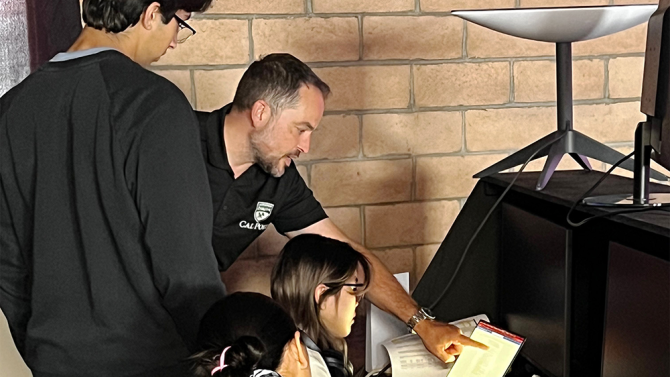 professor working with students