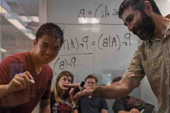 Professor helping student